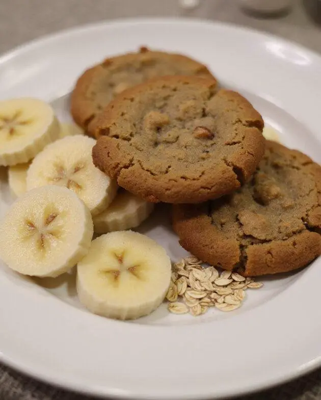 Freshly baked healthy sugar-free banana cookies served on a plate, perfect for guilt-free snacking.